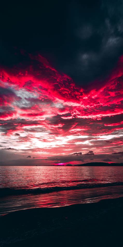 Download 1080x2160 wallpaper sea, sunset, red clouds, nature, honor 7x, honor 9 lite, honor view 