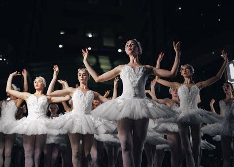 Group Of Ballerinas Dancing While Raising Both Hands Lago De Los