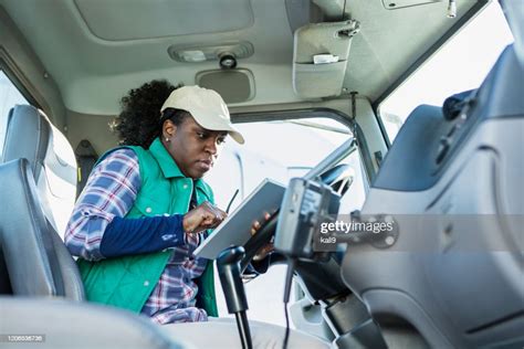 Africanamerican Woman Driving A Semitruck High Res Stock Photo Getty