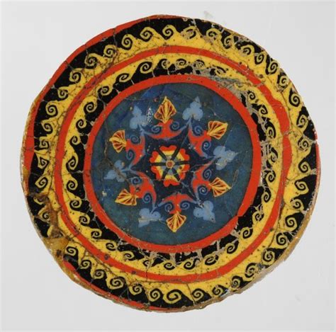 Circular Fragment Of Polychrome Glass Inlay Central Ornament Of Blue Yellow And Red With Two