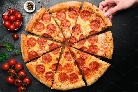 Hand Pickin Slice Of Pepperoni Pizza High Quality Food Images