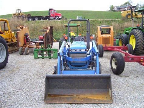 Ford New Holland 1620 4wd Tractor W Loader Mower Oct 02 2008 Quarrick Equipment And Auctions
