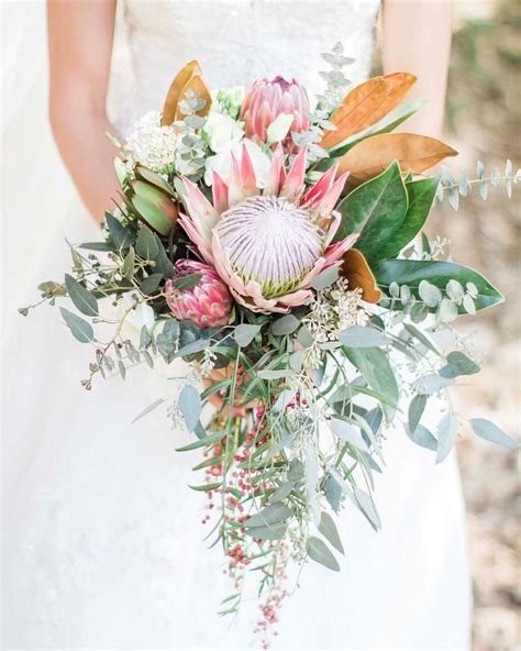 Summer Fall Wedding Bouquet With Protea Magnolia Leaves Pepperberry