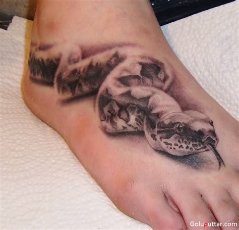 Here, snake tattoos are juxtaposed with real snakes that firmly blur the lines between nature and art. 3D Tattoos
