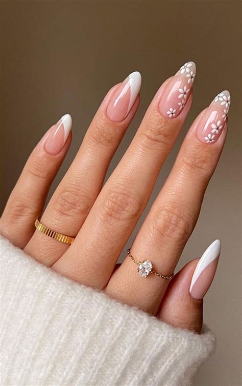 52 Cute Floral Nail Art Designs White Floral And White Side Tip Nails
