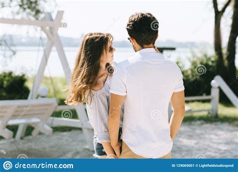 Heterosexual Couple Standing At City Beach Stock Image Image Of Caucasian Embrace 129069001