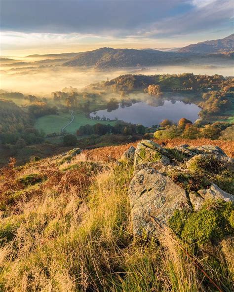 Morning Mist Over Loughrigg Tarn Lake District England By Daniel Kay