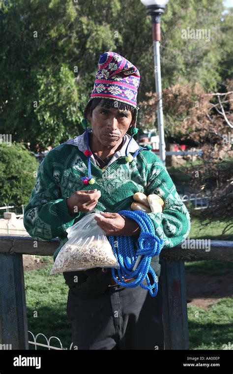 A Traditional Bolivian Man Campesino Peasant Wearing A Colourful