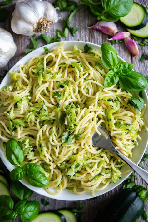 Garlicky Pasta Recipe That Is Tossed In Sautéed Zucchini And Topped