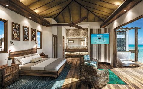 The caribbean is getting overwater bungalows, too. Sandals Is Building More Caribbean Overwater Bungalows