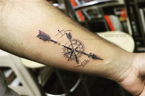 Arrow With Compass Tattoo Done By Sachin Arrow Compass Tattoo Arrow Tattoos Meaning Of Arrow