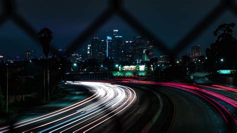 Road Long Exposure Turn City Lights Night Movement 4k Hd Wallpaper
