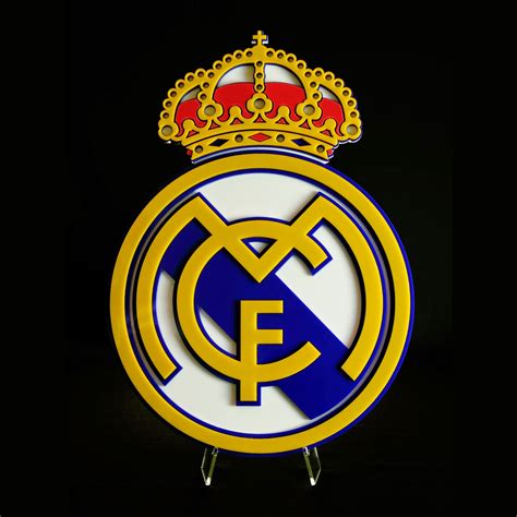 The very first real madrid logo was designed in 1902 and featured an mfc monogram, standing for madrid football club. REAL MADRID