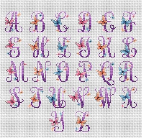 Cross Stitch Alphabets With Butterflies And Letters In The Shape Of