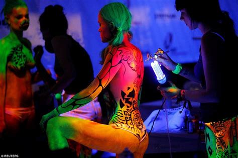 Multi Colour Artists Use Ultraviolet Light Paint On Models During The World Bodypainting Ai