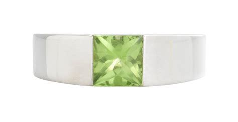 Sold Price Cartier 18ct White Gold And Peridot Tank Ring 1990