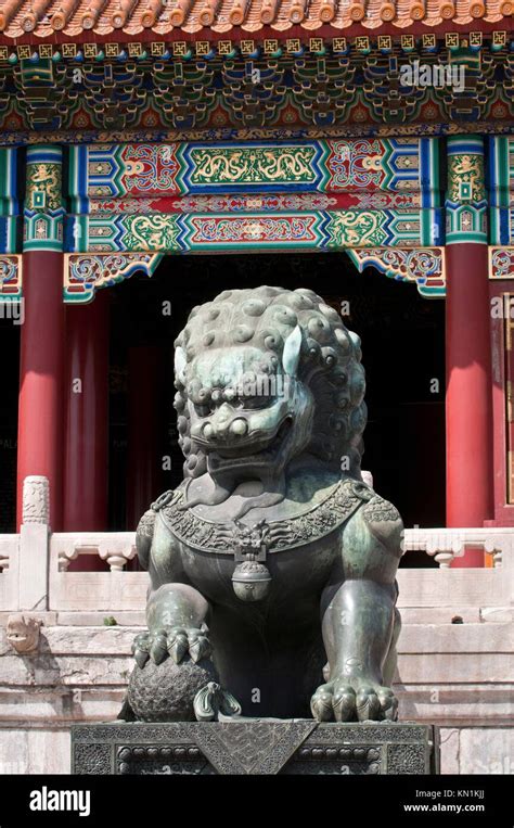 Bronze Lion Statue In Front Of Gate Of Supreme Harmony In Forbidden