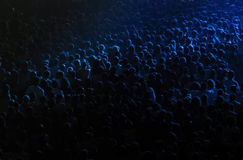 Dark Background Of Crowd At Concert Colorfully Behr