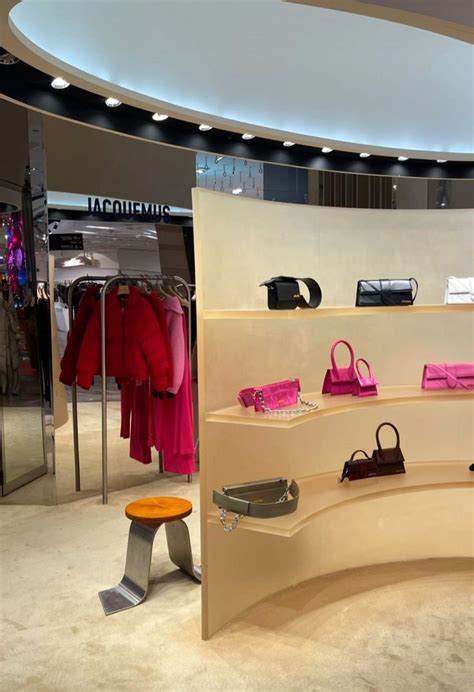 A Display In A Retail Store Filled With Handbags And Purses