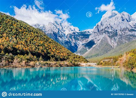 Summer Landscape With River And Mountain Snow Stock Photo