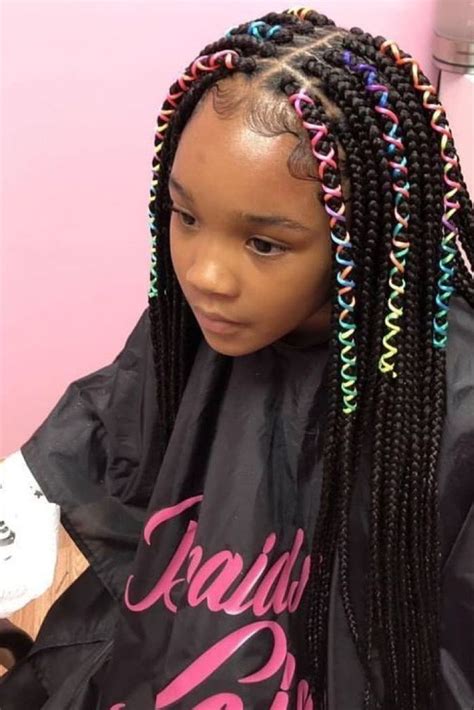 Portrait of a lovely little girl with slender body on a black. Pin on Black girls hairstyles