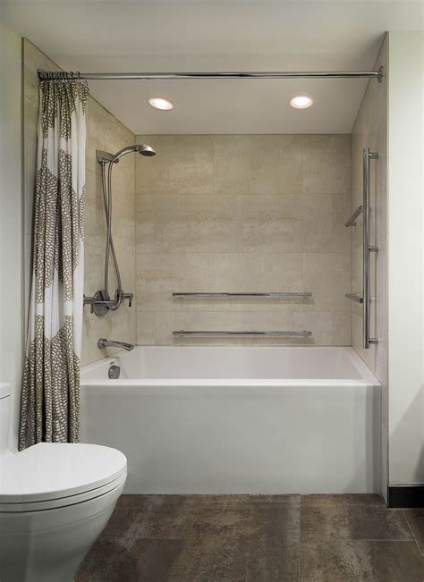 Check Out This Deep Soaking Tub Equipped With A Mounted And Handheld