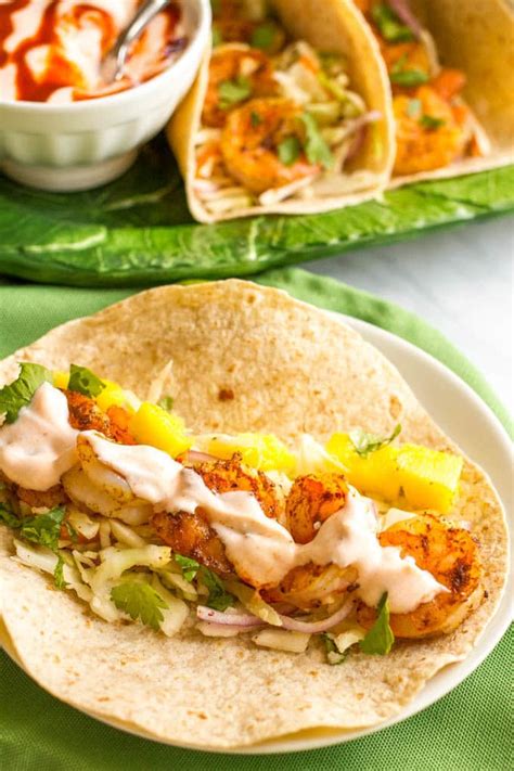 Fish tacos with spicy cabbage slaw. Shrimp tacos with lime cabbage slaw and spicy yogurt sauce ...