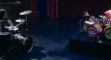 Watch Animal Vs Dave Grohl In An Epic Drum Battle