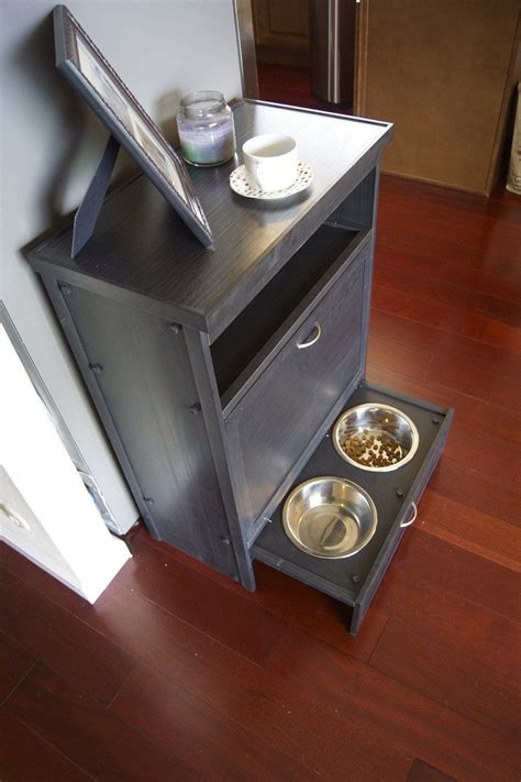 When it's mealtime, pull out the lower shelf, which hides 2 stainless steel pet bowls. Darla's Pet Pantry Feeder Furniture | Dog food storage diy ...