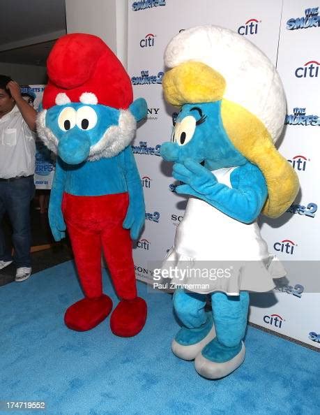 Papa Smurf And Smurfette Attend The Smurfs 2 New York Blue Carpet
