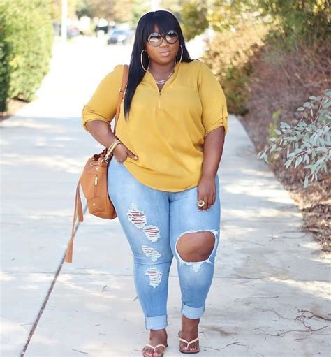 there is endless street style inspiration for how to make ripped jeans look chic af plus size