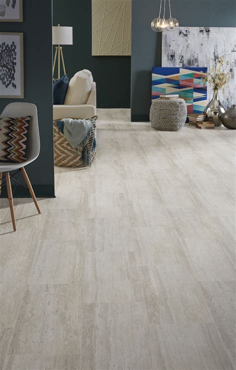 If your vinyl meets the basic requirements, it requires some preparation before you lay ceramic or stone tile over it: Luxury Vinyl Flooring in Tile and Plank Styles - Mannington Vinyl Sheet Flooring
