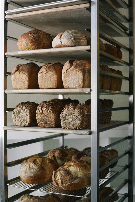 Bakery Rack Assorted With Variety Of Breads By Stocksy Contributor