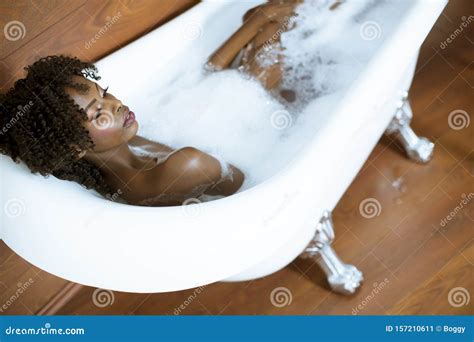 Beautiful African American Woman Bathing In A Tub Full Of Foam Stock Image Image Of Bath