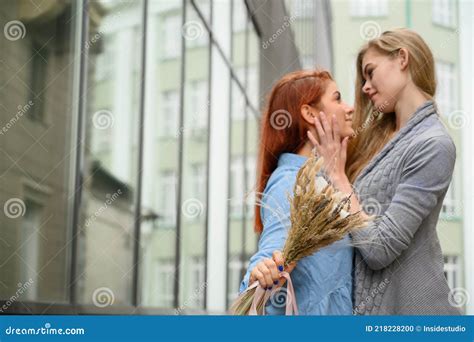 Same Sex Relationships Happy Lesbian Couple With Dried Flowers Stock