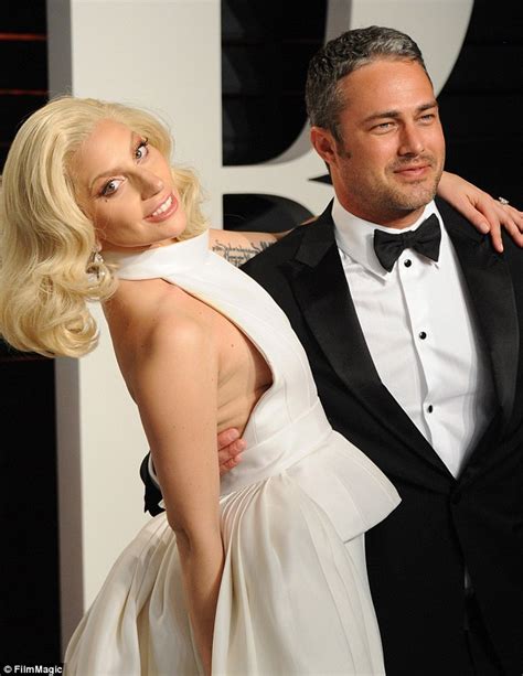 Lady Gaga Shares A Kiss With Taylor Kinney On Arrival To Vanity Fair Oscar Party Daily Mail Online