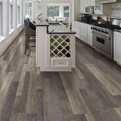 If you ask me, i would say laminate flooring is responsible for many of the current kitchen flooring trends and other flooring. Vinyl makes a comeback in tile, plank designs, with new ideas in porcelain | Real Estate ...