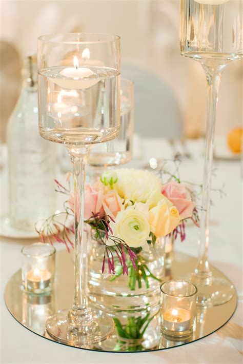 Floating Candle Centerpiece On A Round Mirror Base With Fresh Flo