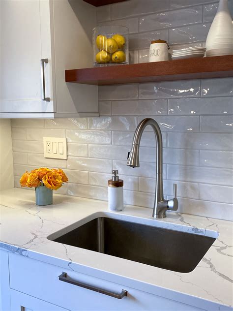 The Subway Tile Backsplash Adds Texture And Interest With A Wavy