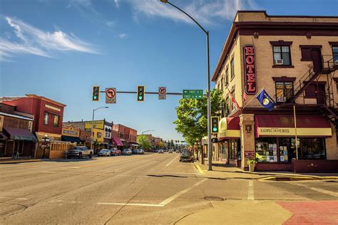 Street View With Stores And Hotels In Kalispell Montana Photograph By