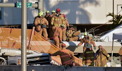 At Least Six Dead After Pedestrian Bridge Collapse In Florida