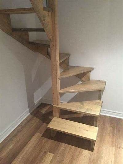 There Is A Wooden Stair Case In The Room