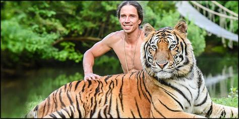 Video Of Man Playing With Tigers Goes Viral Tamil News IndiaGlitz Com