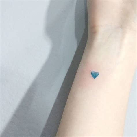 19 Tiny Tattoos To Get In An Unexpected Place Heart Tattoo Wrist