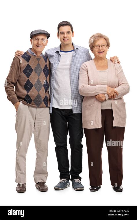 Full Length Portrait Of A Two Seniors And A Young Man Posing Together
