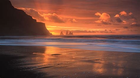 Nature Landscape Sunset Beach Sea Rock Island Clouds Glowing Waves Sun