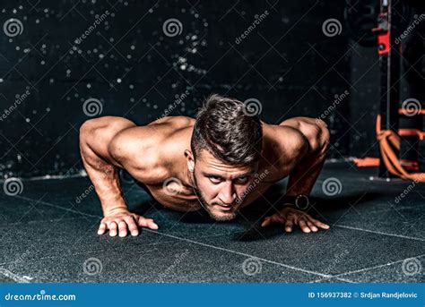 Strong Young Toned Muscular Fitness Man Push Ups Workout Training On