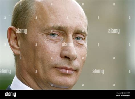 Russian President Vladimir Putin During A Joint Address In The Courtyard Of The Elysee Palace In