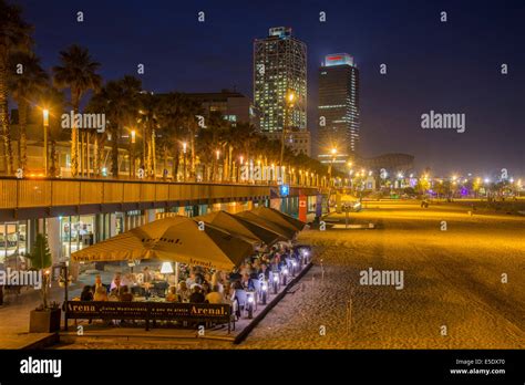 Night View Over An Outdoor Restaurant On The Sandy Beach Barcelona
