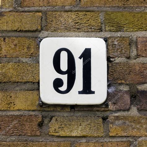 House number 91 — Stock Photo © papparaffie #87323542